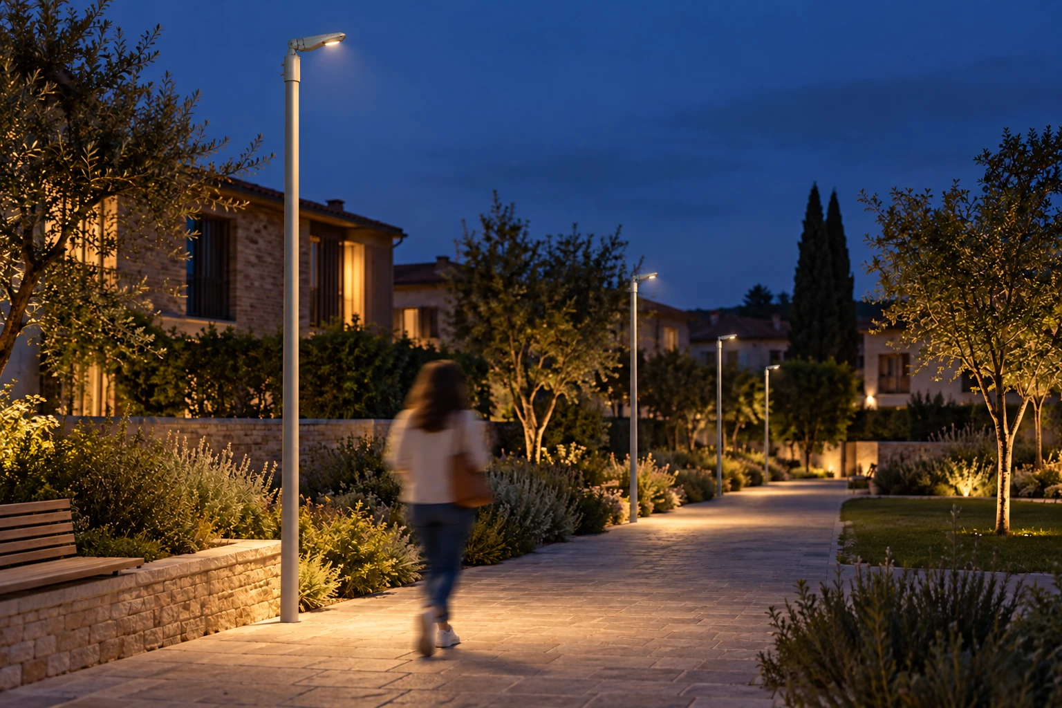 ITALICO20 Mini on poles along a residential path at dusk, with a 384 × 251 × 187 mm housing and illustrative warm-white light.